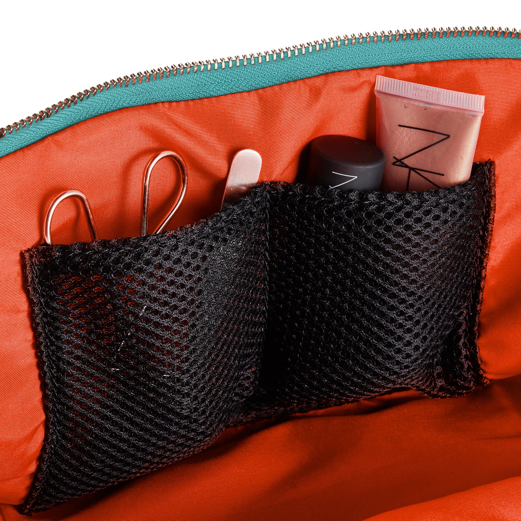 color: Sea Green Fabric with Bright Orange Interior; alt: Vacationer Large Makeup Bag | KUSSHI