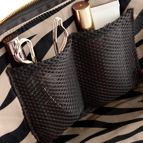 color: Signature + Luxurious Black Leather with Zebra Interior