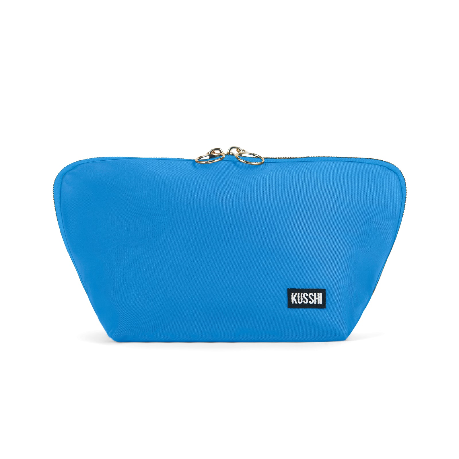 color: Electric Blue Fabric with Neon Pink Interior; alt: Signature Medium Size Makeup Bag | KUSSHI