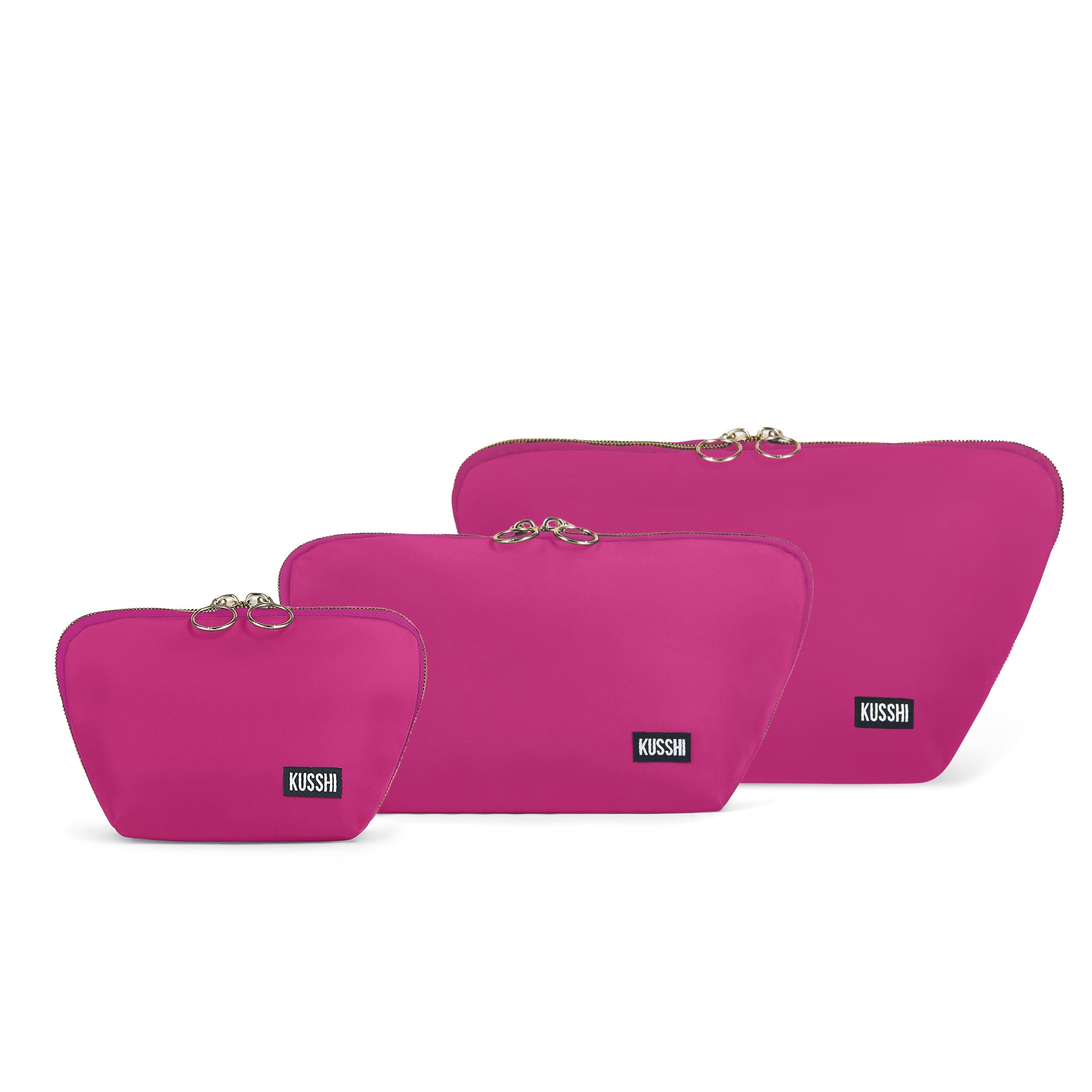 color: Pink Fabric with Teal Interior; alt: The Complete KUSSHI Set Makeup Bag | KUSSHI